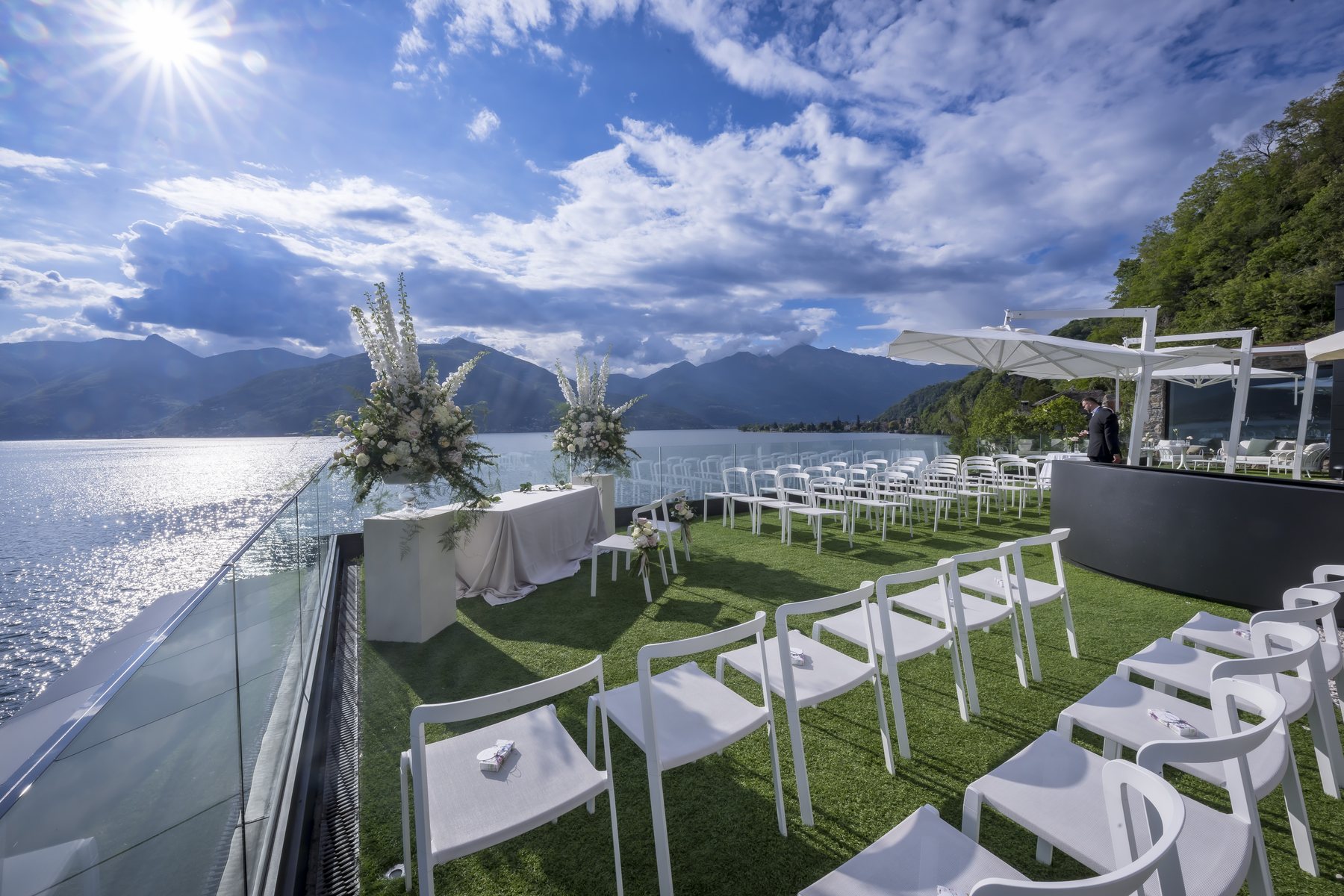 The ceremony terrace at Villa Porta, set up with white chairs overlooking Lake Maggiore