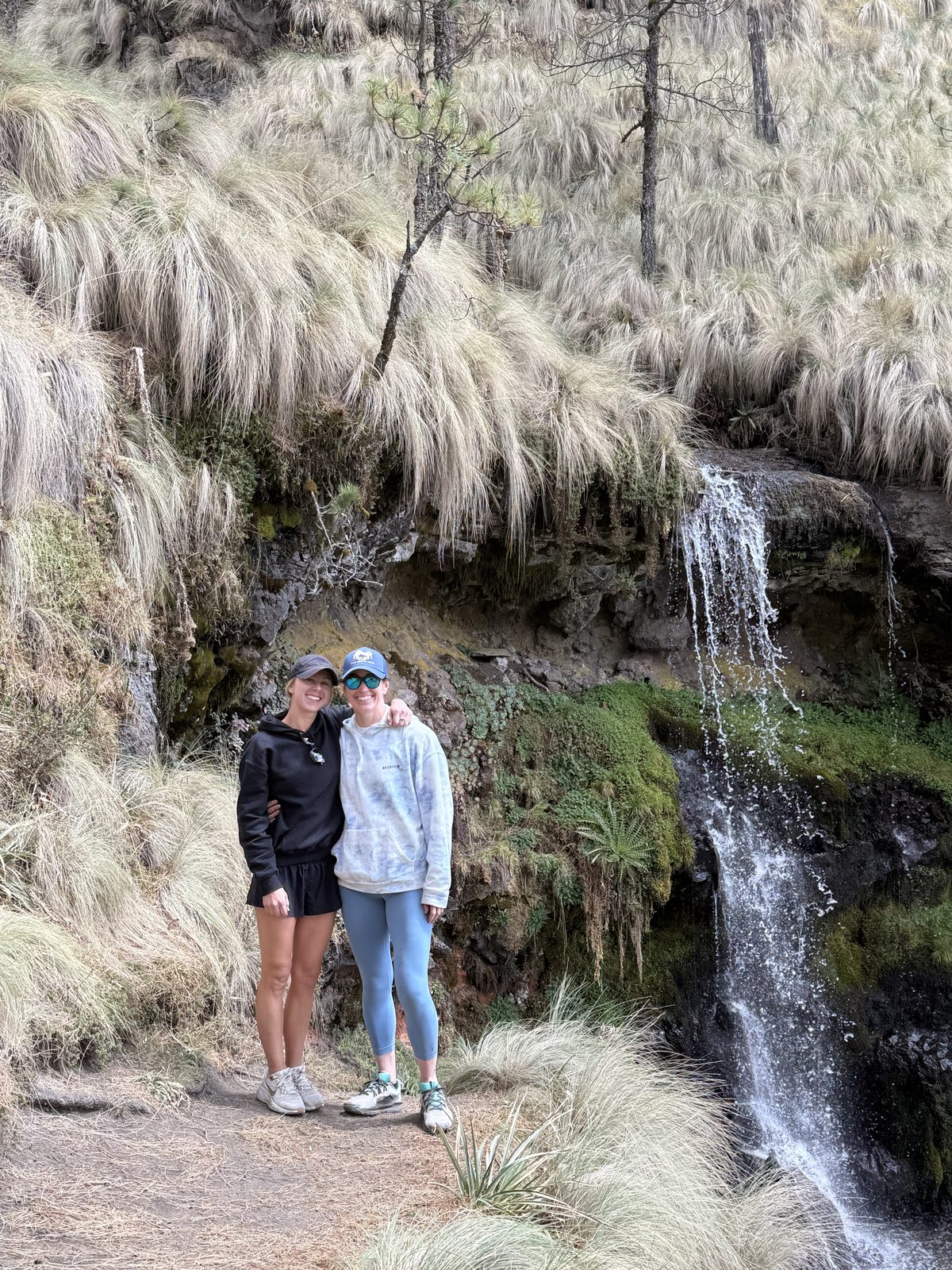Amy and Megan at a waterfall hike in Mexico